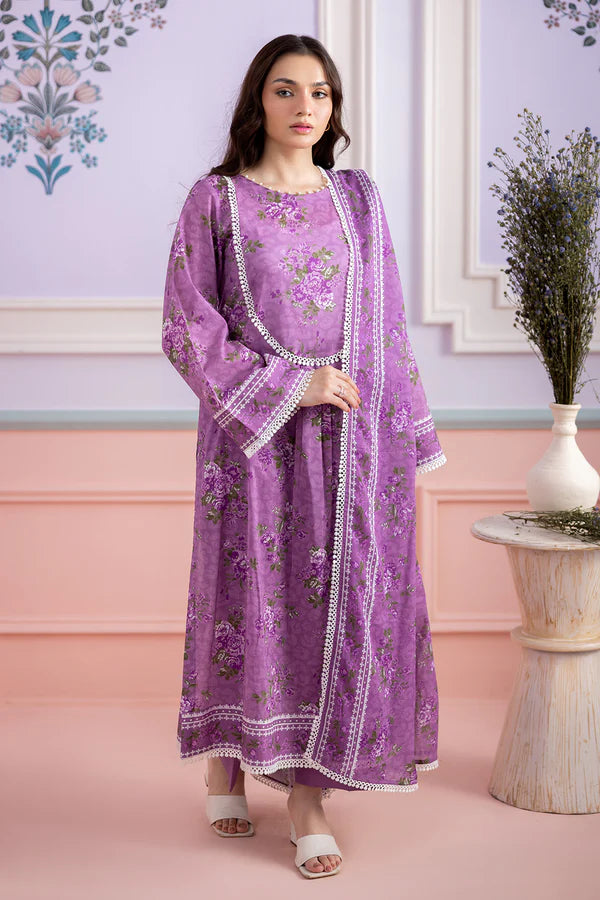 Woman wearing a purple floral dress with white lace details in a decorated room.